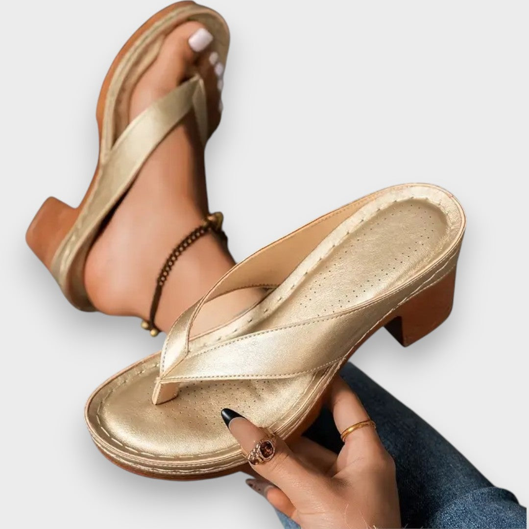 Zapatilla con tacón