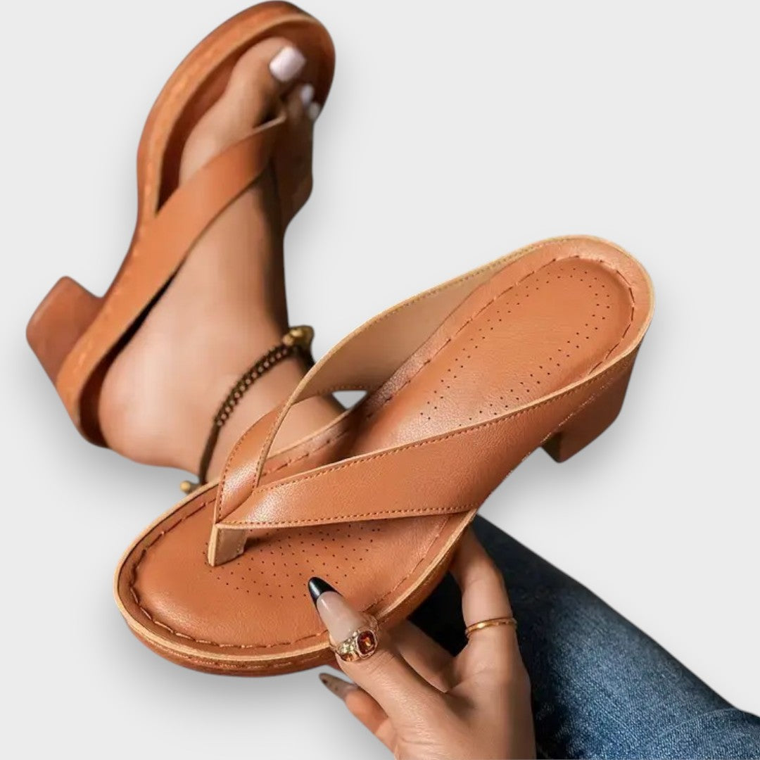 Zapatilla con tacón