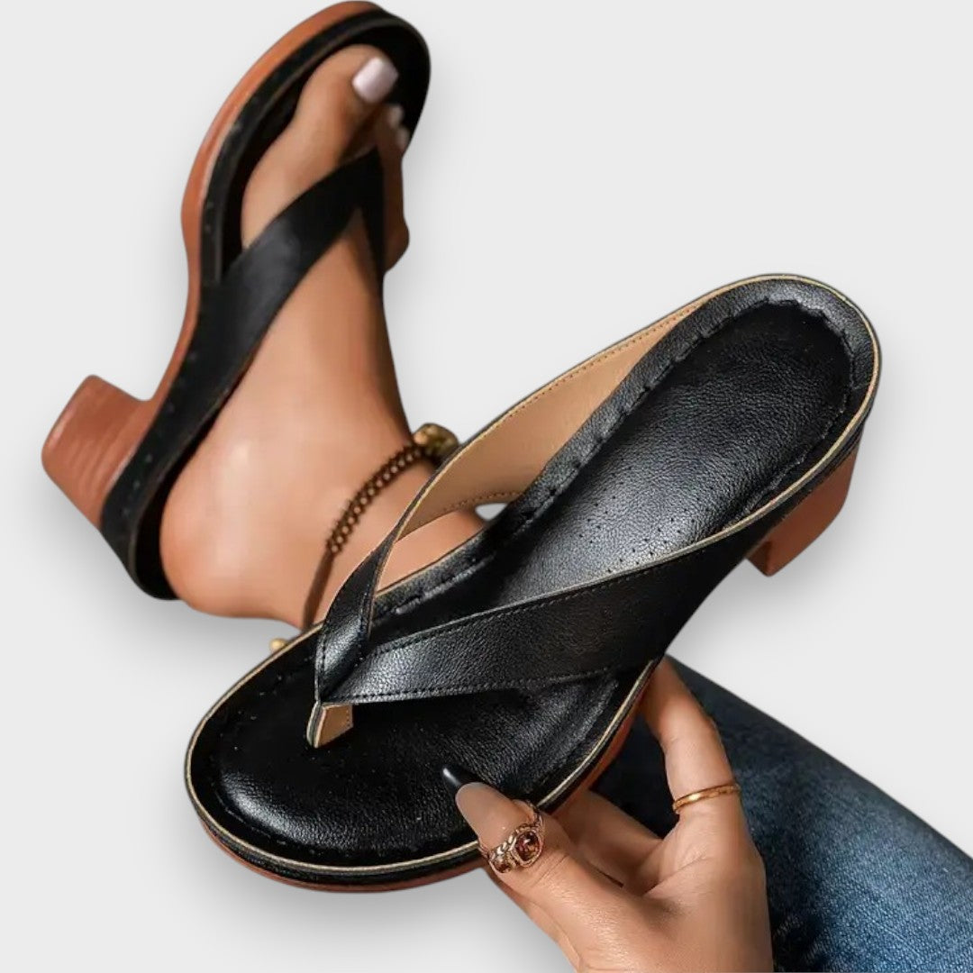 Zapatilla con tacón