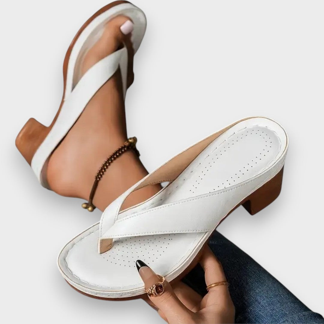 Zapatilla con tacón