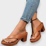 Zapatilla con tacón